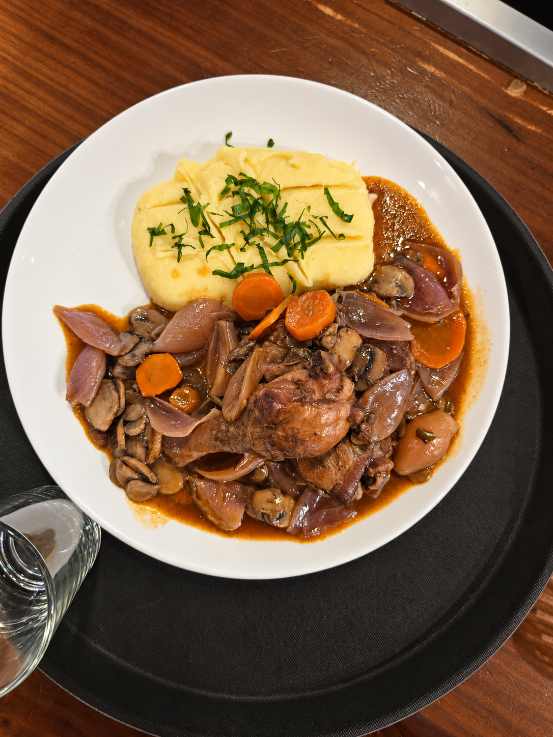 A dish from Le Bistro’s kitchen, served with mashed potatoes and vegetables.